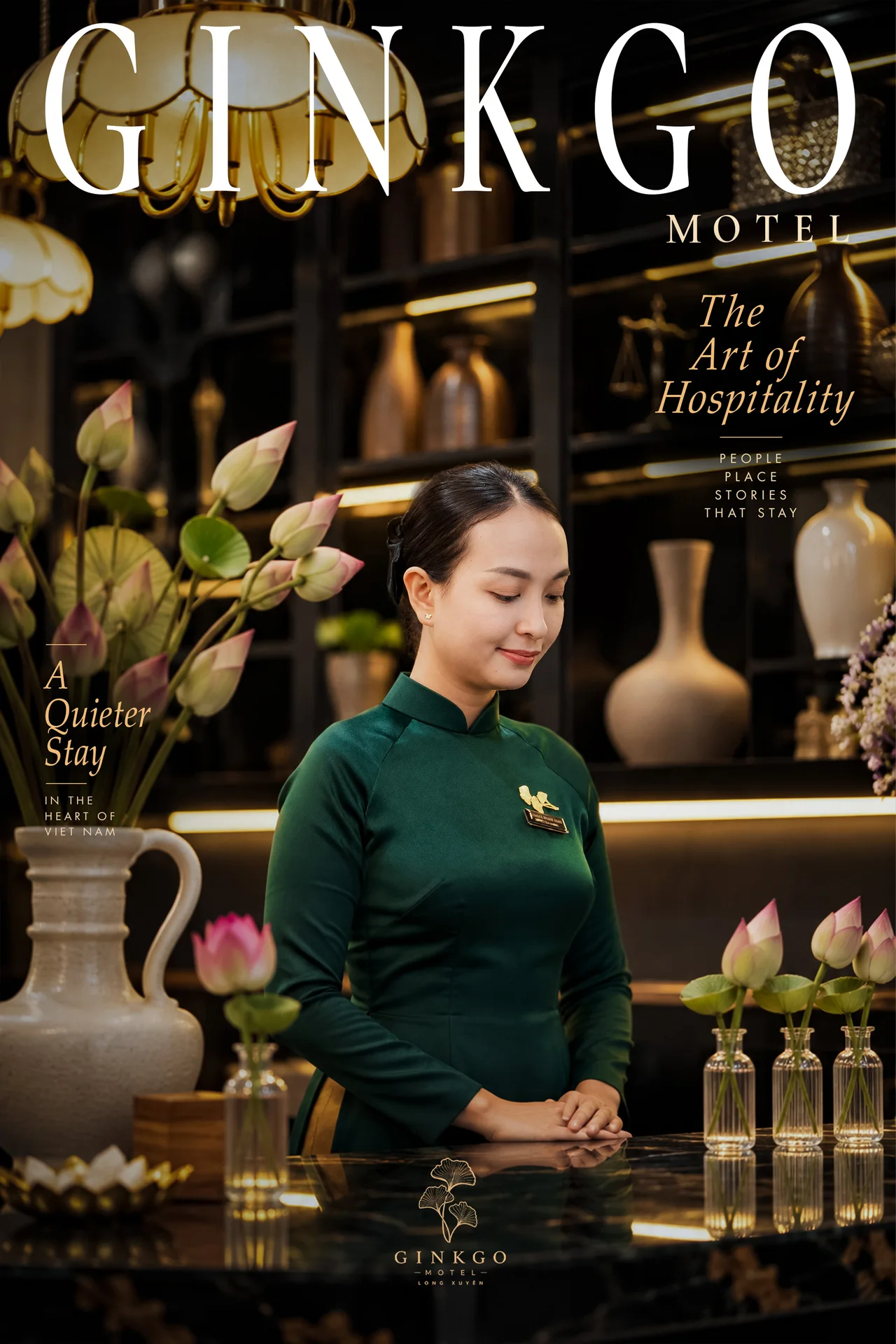 Ginkgo — The Art of Hospitality. A quieter stay in the heart of Viet Nam. Lễ tân trong tà áo dài xanh.